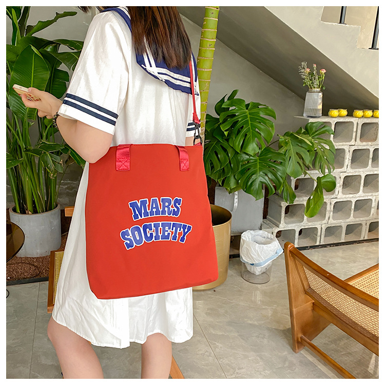 Canvas bag for women, single shoulder, ins crossbody, laid-back style, college student class bag, artistic Japanese style, large capacity, Hong Kong style, chic undefined