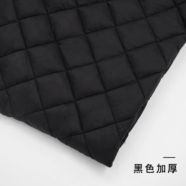 Black wired thick quilted cotton