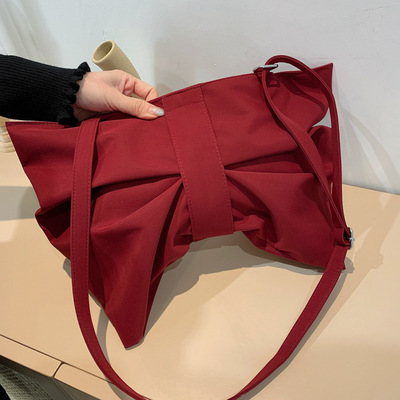 上新小包包女2021新款可爱蝴蝶结少女斜挎包韩版可爱尼龙单肩小包|ms