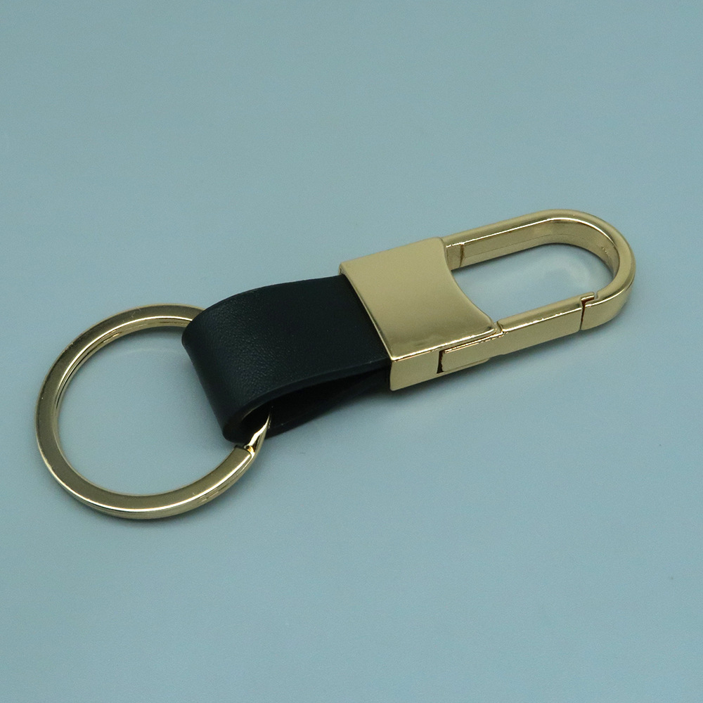 Venta directa de fábrica de llaveros de coche de metal y cuero genuino con logotipo grabado con láser, llaveros creativos. image 21