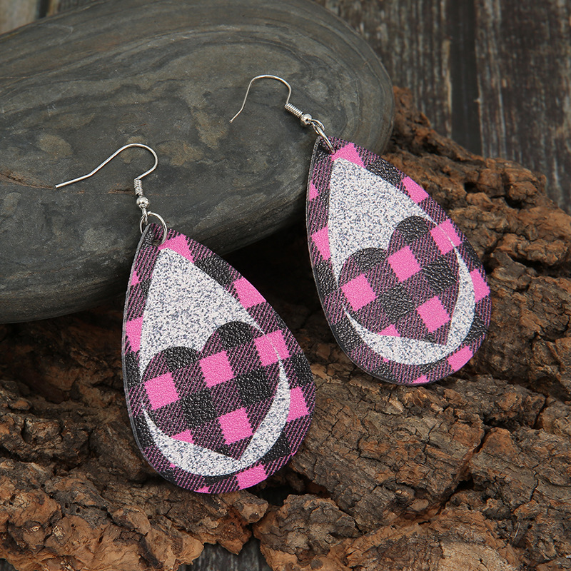 New Pink Black Grid Silver Sequined Leather Earrings Peach Heart Hollow Earrings Wholesale display picture 2