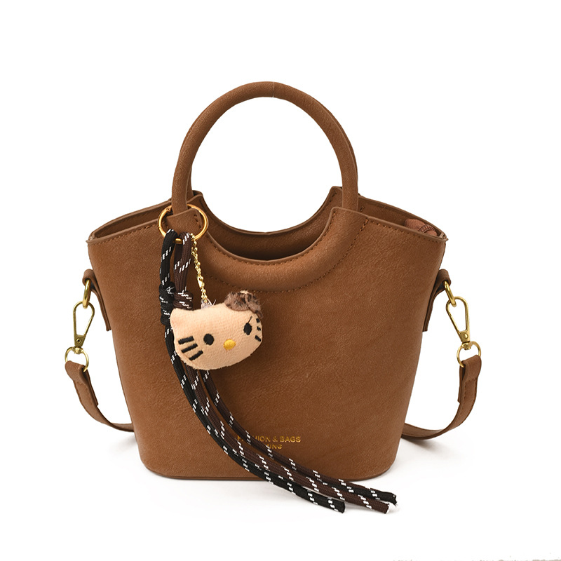 2025 otoño y invierno nuevo bolso retro mochila esmerilado bolso de hombro de moda de mujer bolso de cubo de viaje