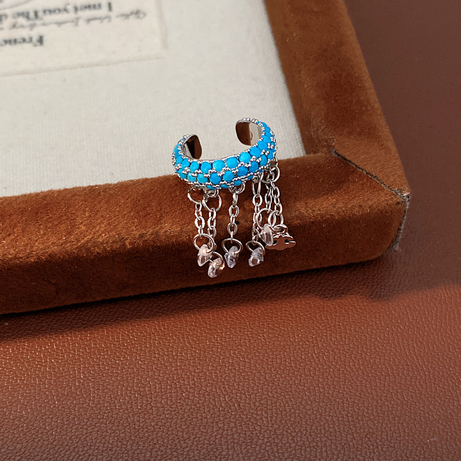 Orejeras - plateadas - azules - individuales - borlas