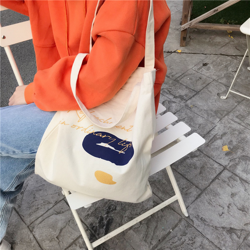 E131 canvas bag, Korean-style ins hand-held shoulder bag, color block letter graffiti shopping bag, female student's search for sources undefined