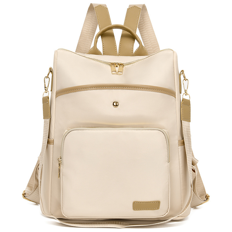 Mochila de tela Oxford nueva transfronteriza para mujer Mochila de moda estilo coreano retro mochila de viaje de moda con remaches simples