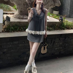 高ji感気質スーツの袖なしのゆったりした蝶結びのベストの女性服の夏の高腰はお尻の半身のスカートの2つのセットを包みます。