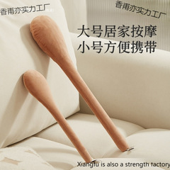マッサージ店のカッピング器具、背中と脚のマッサージスティック、筋肉をリラックスさせるためのノックアーティファクト