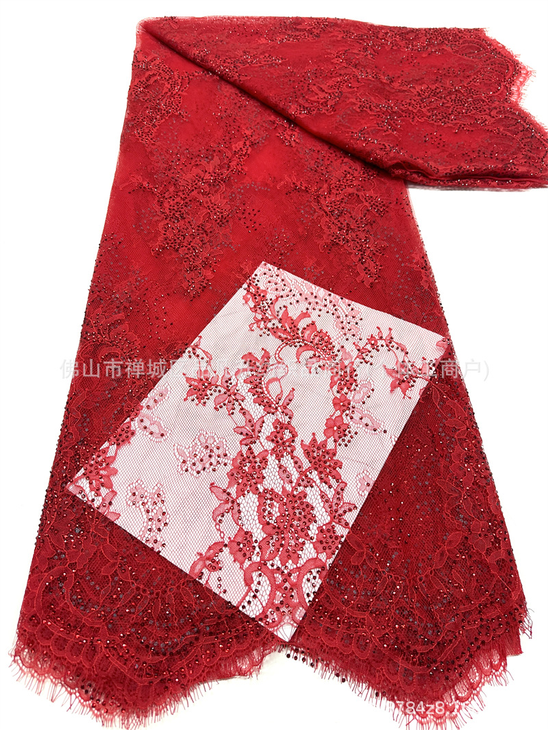 Tejido de malla de pestañas de encaje caliente flor retro hecha a mano verde diamante de cola de pez vestido de noche tela de boda en stock
