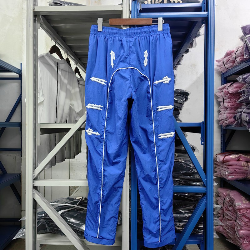 Marca de moda chaqueta trapstar traje bordado carta logo cinta cremallera trench coat Pantalones image 8