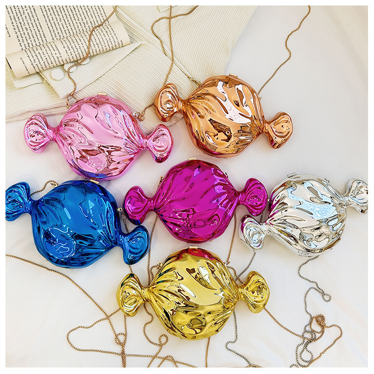 Bolsa de cena de lujo ligera transfronteriza cara brillante personalidad forma de caramelo bolso de mochila moda acrílico cadena bolso de noche mujer