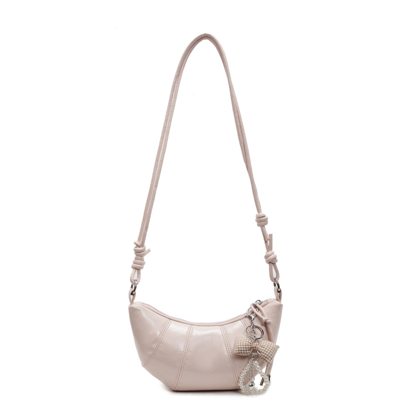 Bolso de todo fósforo de diseño de nicho para mujer 2025 nuevo bolso de cuerno de costura de color sólido bolso de axila de sentido avanzado de viaje casual