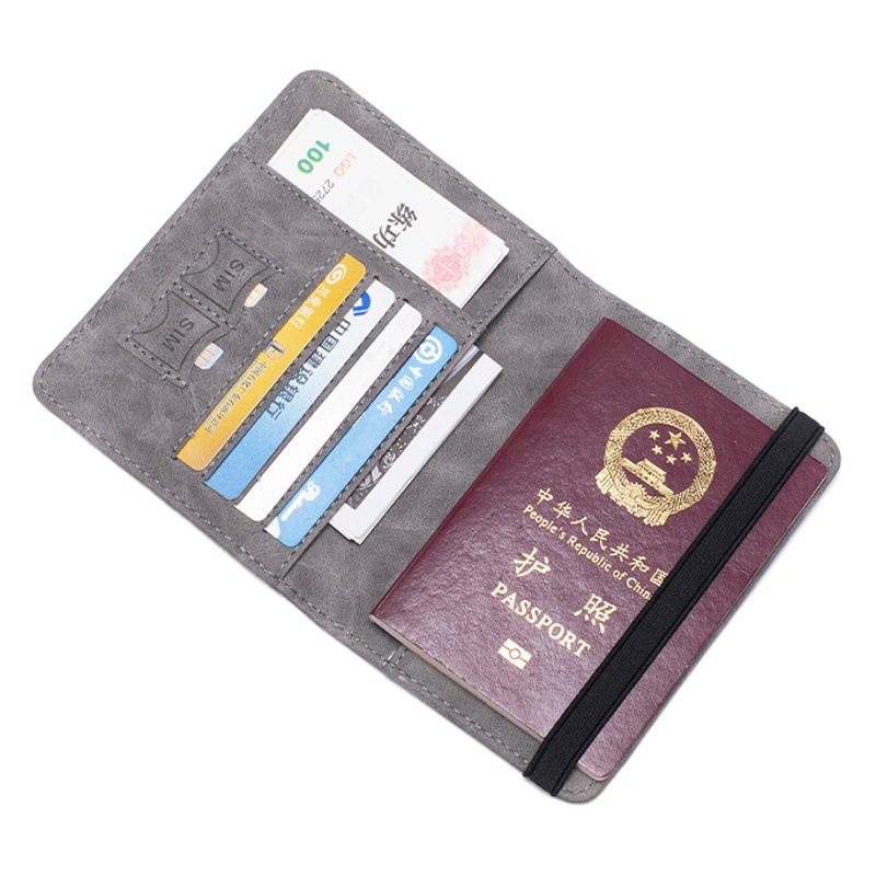 Nuevo anti-magnético RFID pasaporte libro multifuncional tarjeta ID titular pasaporte cubierta al por mayor transfronteriza plegable PU boleto titular