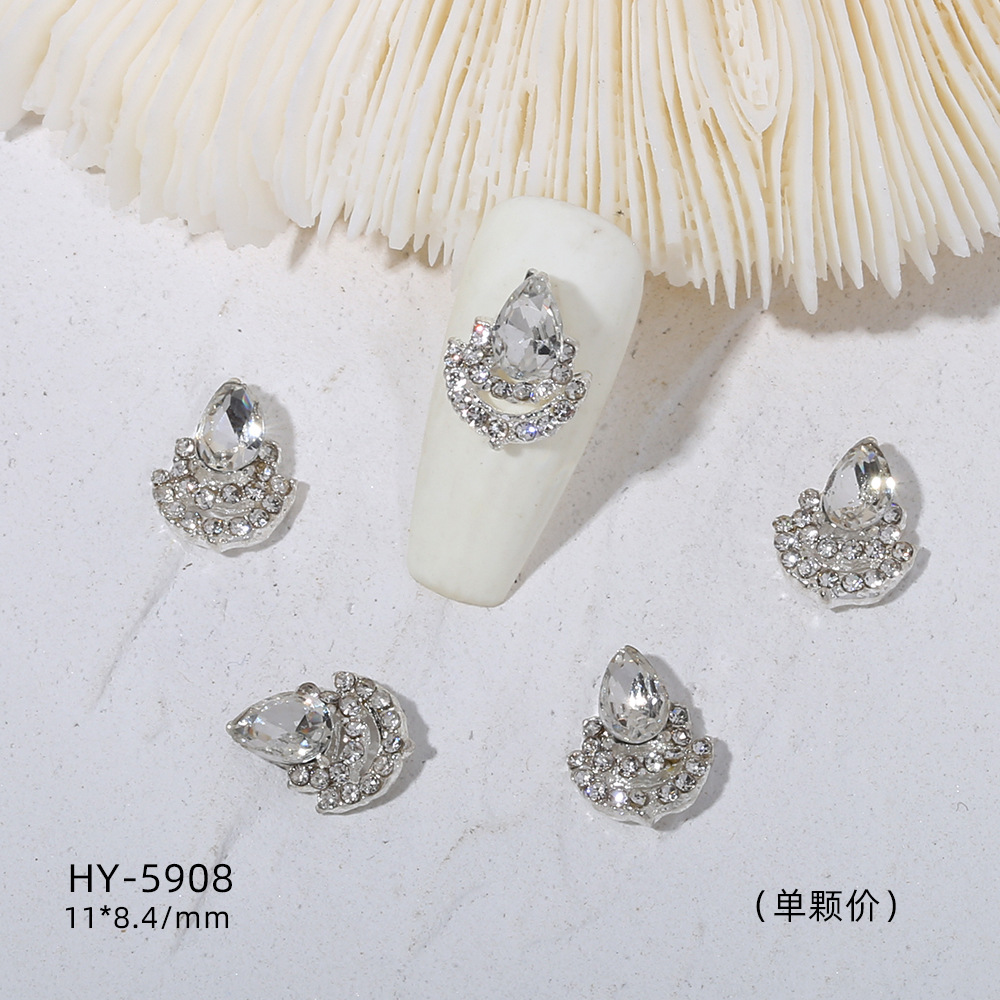 Venta caliente taladro de uñas arco de plata joyería tridimensional flash diamante esmalte de uñas decorativo diamante acabado pieza de uñas traje de joyería