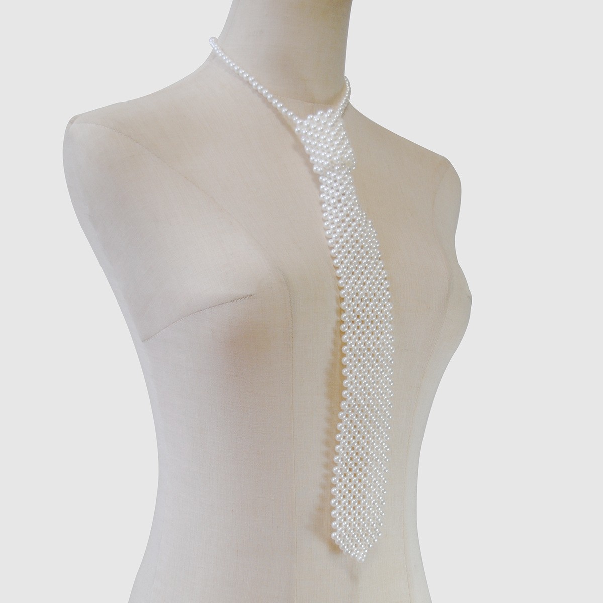 Joyas transfronterizas europeas y americanas cadena de cuerpo de perlas hueca creativa moda sexy chal de perlas borla cadena de pecho de alta calidad