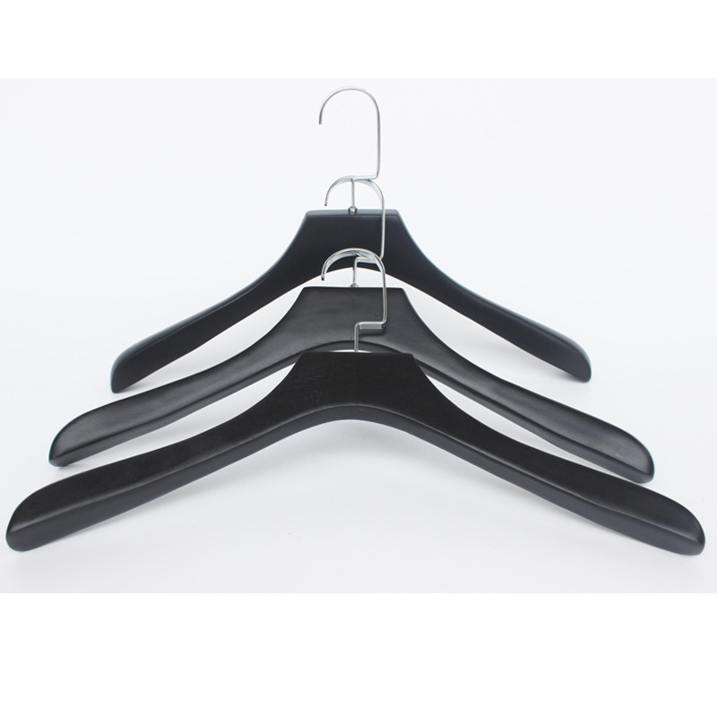 Black wooden hanger from natural wood for home use