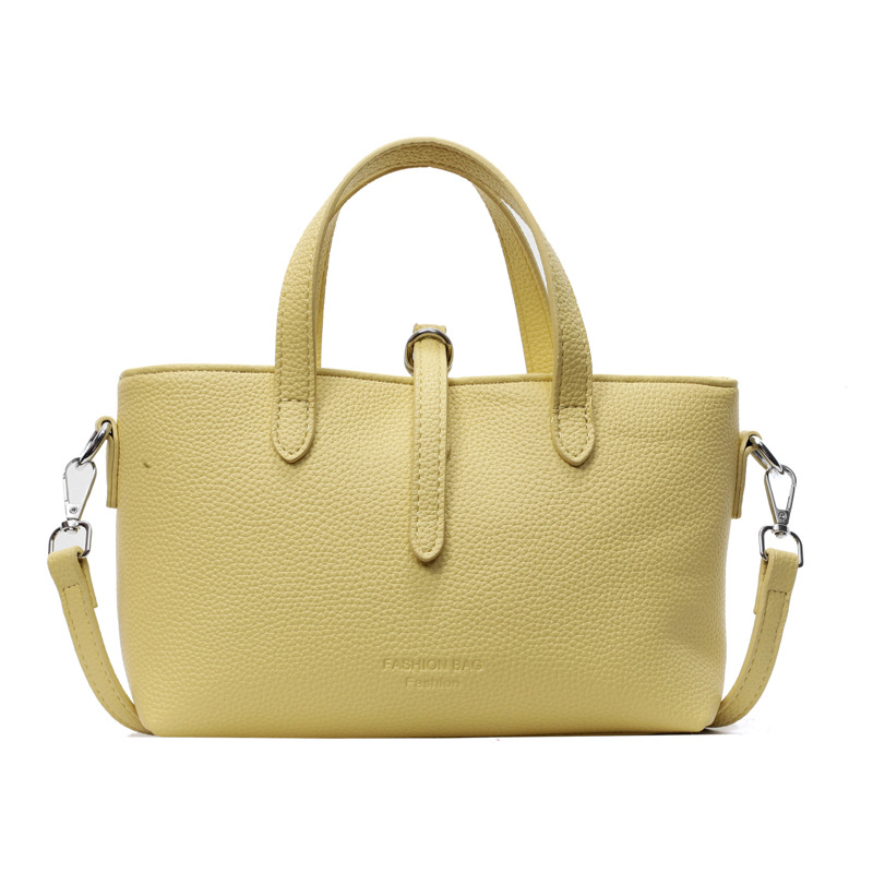 Bolso de mano simple de comercio exterior para mujer 2025 nuevo bolso de hombro de color sólido de todo fósforo bolso de mensajero de textura de moda popular