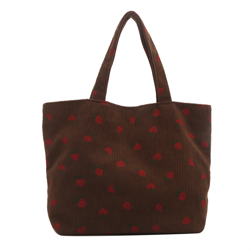 2026 nuevo bolso de transporte de gran capacidad impresión de fresas bolso de hombro de estudiantes