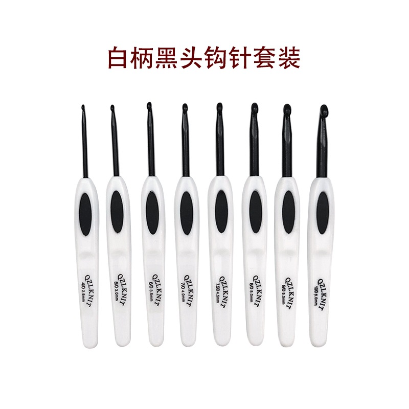 Juego de ganchillo de espinillas con mango blanco