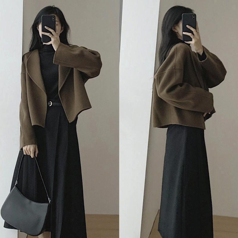 フランス風の気質の毛は上着の女性の秋冬の2024の新型のデザイン感の中で長いタイプの高腰が見えて痩せています。|undefined