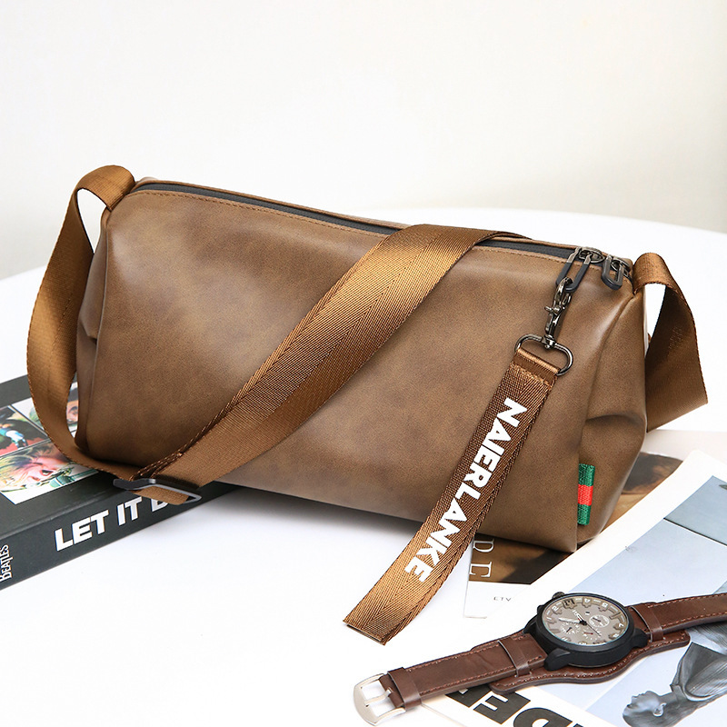 New upgraded summer men's crossbody bag fashion cylinder small bag Korean outdoor riding bag fashion shoulder bag