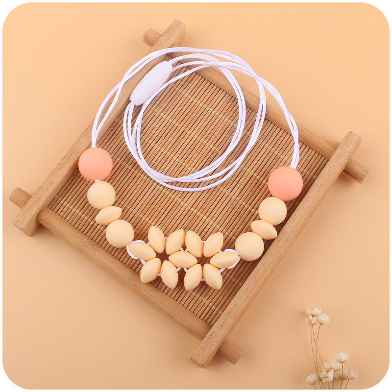 Suministros de bebé collar de flores de dibujos animados bebé creativo cuentas de silicona mordedura molar COLLAR COLGANTE hecho a mano