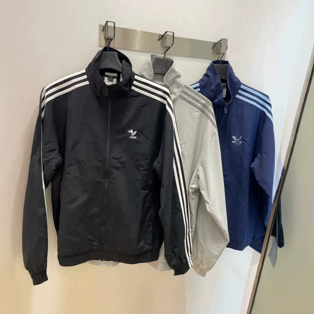 Cross-Border Spring and Autumn Classic Three-Stripe Unisex Trendy Sports Jacket with Stand Collar, Long Sleeves, Couple's Embroidered Outerwear Cross-Border Spring and Autumn Classic Three-Stripe Unisex Trendy Sports Jacket with Stand Collar, Long Sleeves, Couple's Embroidered Outerwear
