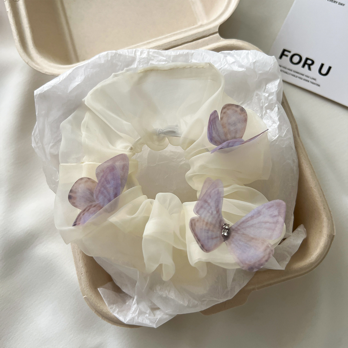 米白色网纱蝴蝶.jpg