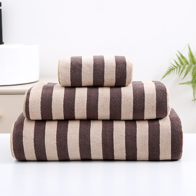 Toallas anchas al por mayor engrosadas absorción suave envueltas cuerpo grande toalla de baño de urdimbre simple toalla de baño de lana de coral