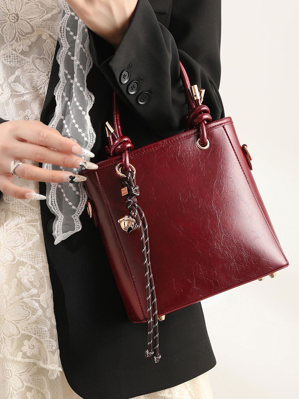 Retro Maillard brown bolso para mujeres 2025 nueva primavera popular bolsa de mochila versátil bolso de cubo de agua super caliente