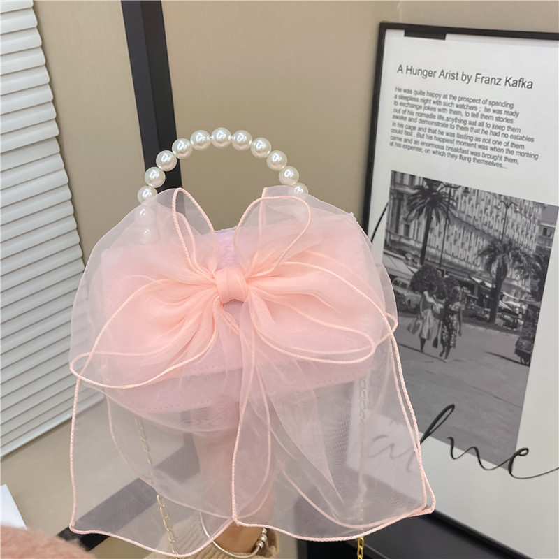 Moda estilo occidental bowknot hombro mensajero bolso lindo bebé monedero todo-Partido mini chica pequeña bolsa