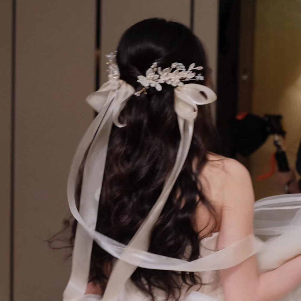 超仙の新婦の頭飾りの長いリボンの美しい髪のクリップの森の蝶結びの後頭部の髪飾りの雰囲気感のアクセサリー