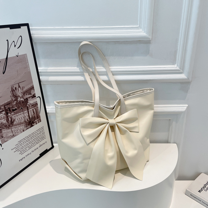 蝴蝶结大容量托特包包女新款小众高级感软面通勤手提包单肩包创意