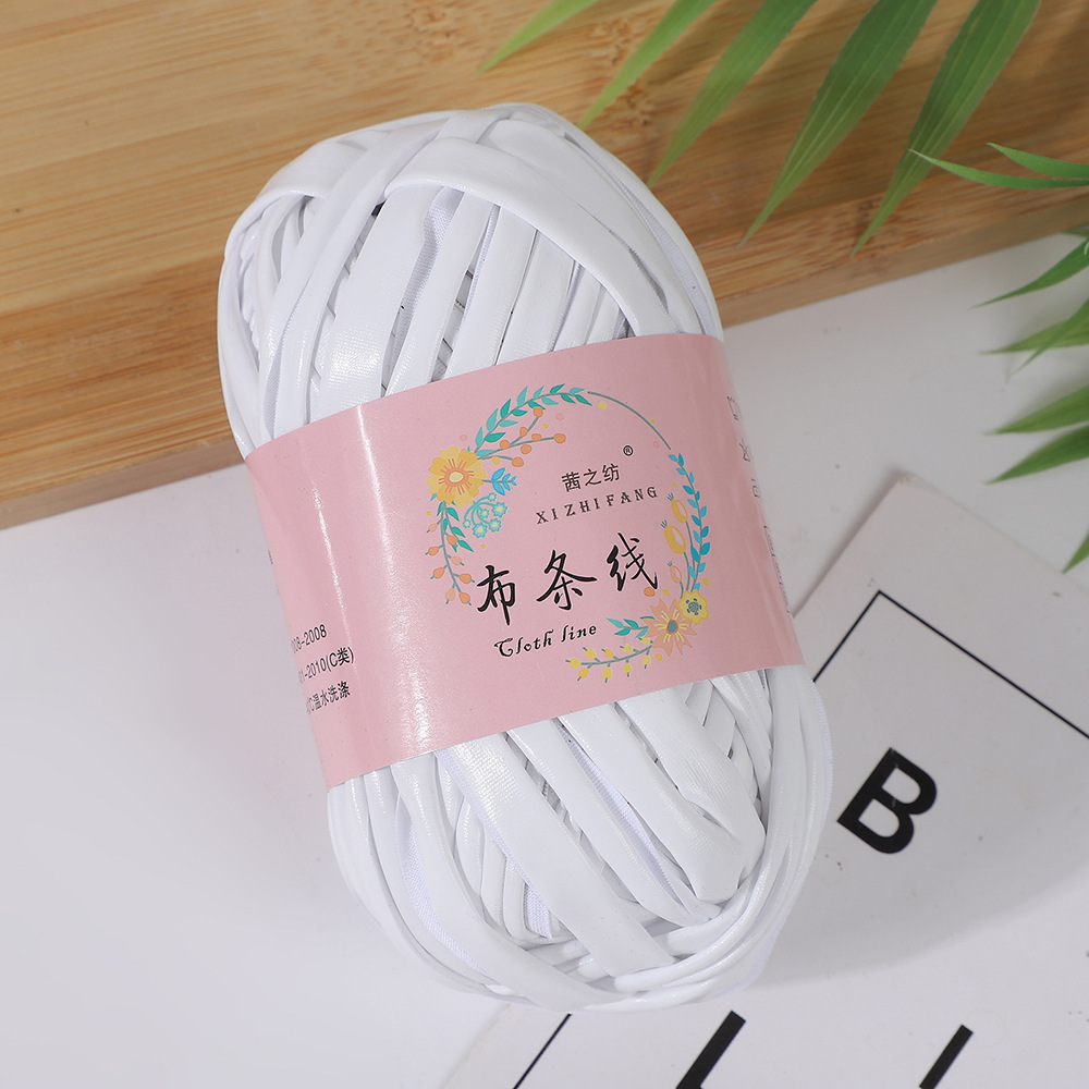 Línea textil Qian Zhi hilo de color mágico tejido a mano hilo de fantasía de color bricolaje en stock fábrica al por mayor