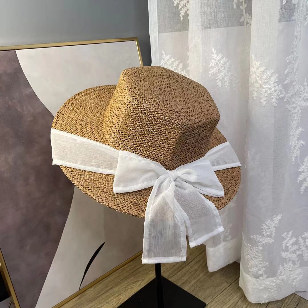 A female hat with a spring and summer ribbon, butterfly sash, hexagonal straw hat, Korean street style, anti-ultraviolet sun hat, and a wide-brimmed hat detail image 6