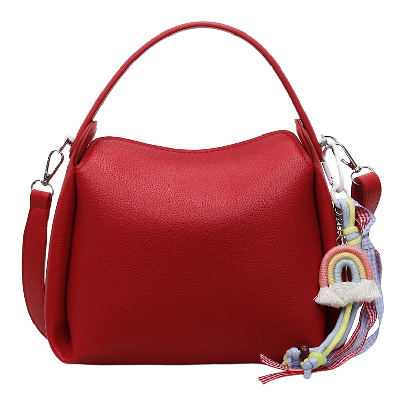 Bolso pequeño de mano para mujer 2025 nuevo bolso de mensajero de hombro de moda de lujo ligero bolso de caja de almuerzo de alta gama de nicho bolso de cubo