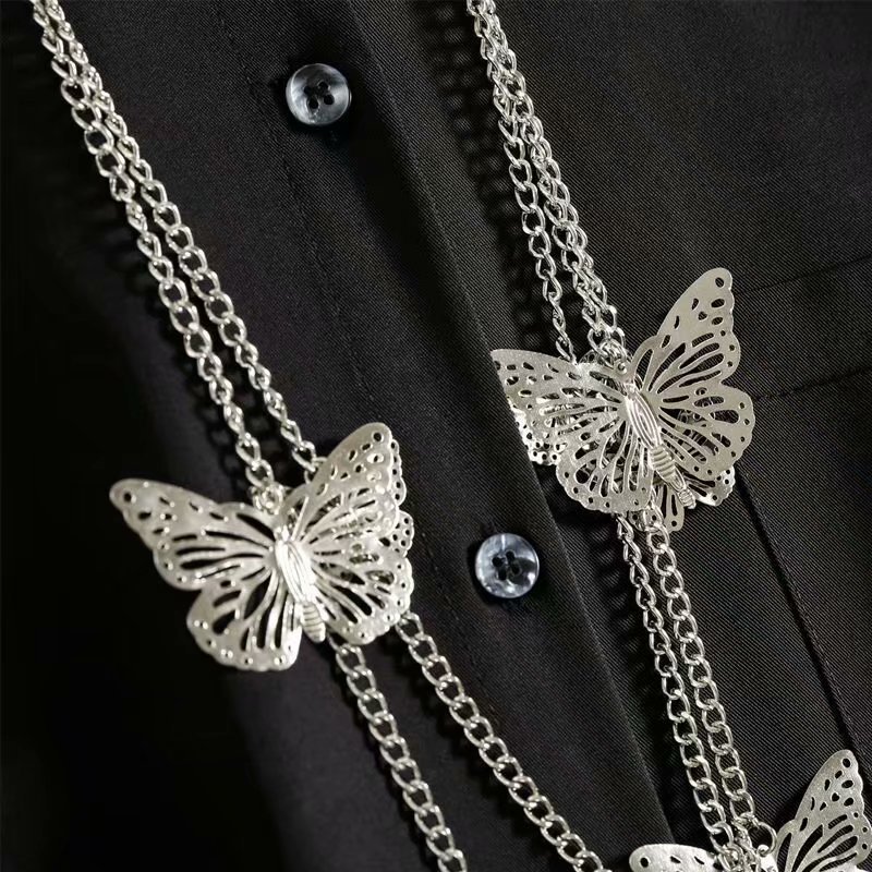 Hong Kong estilo retro tapeta oblicua camisa de manga larga diseño asimétrico flojo irregular cadena hip hop camisa ropa de los hombres