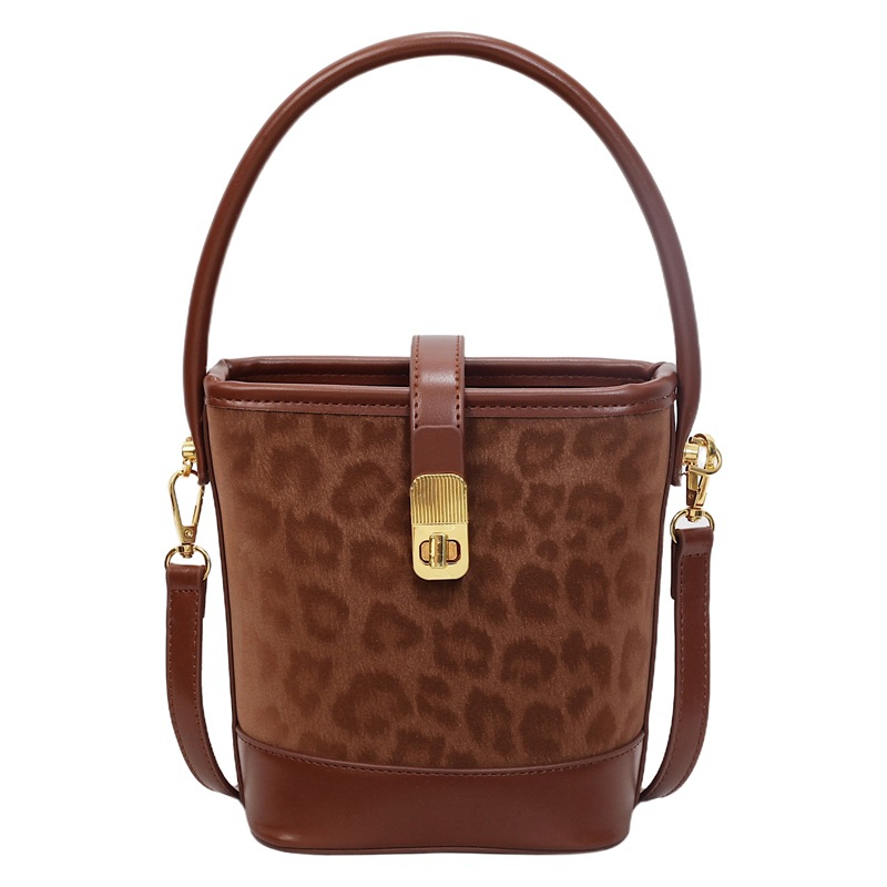 Cross-border 2025 otoño y invierno nuevo bolso de cubo de mano de mujer sensación de alto nivel leopardo mochila retro de viaje