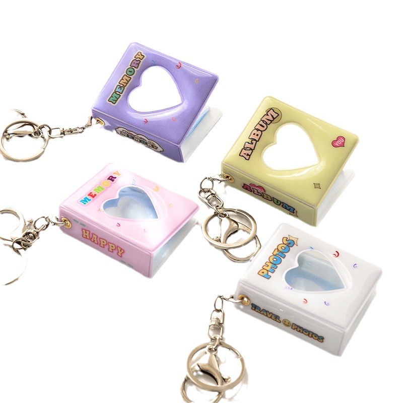 Suministro al por mayor ins amor hueco mini gran álbum de fotos de 1 pulgada con llavero gran cabeza pegatina álbum de fotos