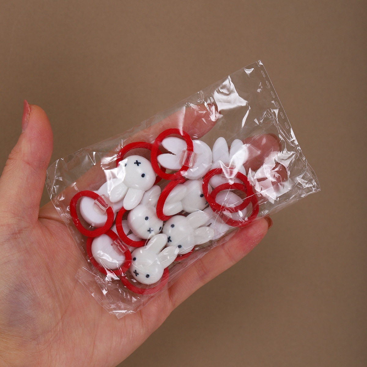 Niños correa de goma niña alta elasticidad no lesiones cabello lindos cabello de estrella de color crema anillo de pelo de pulgar bebé