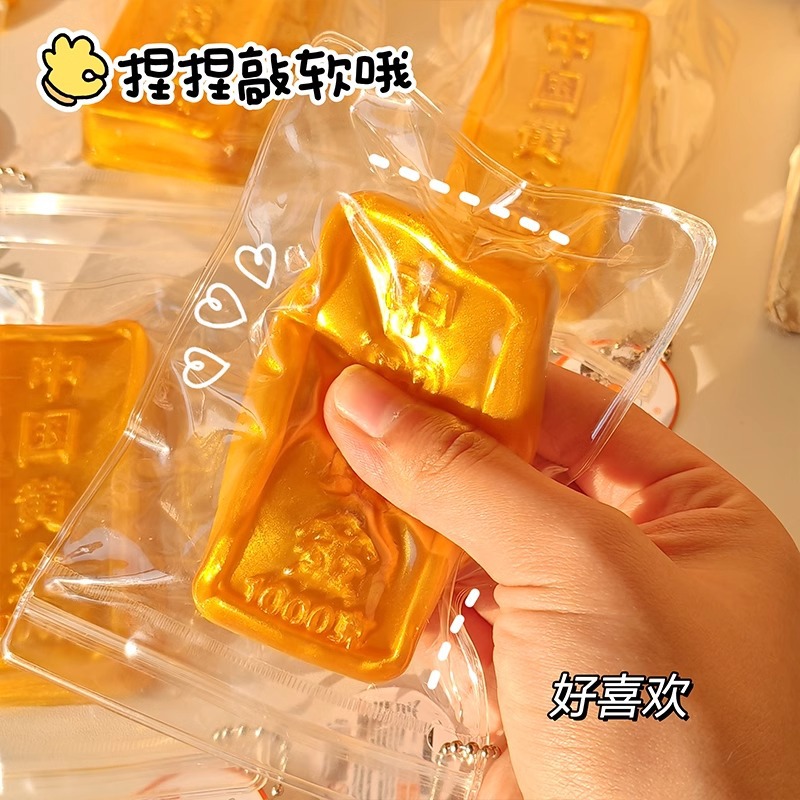 Douyin Explosive Simulation Golden Strip amasar le China Gold amasar le descomprimir y desahogar juguetes de rebote lento al por mayor