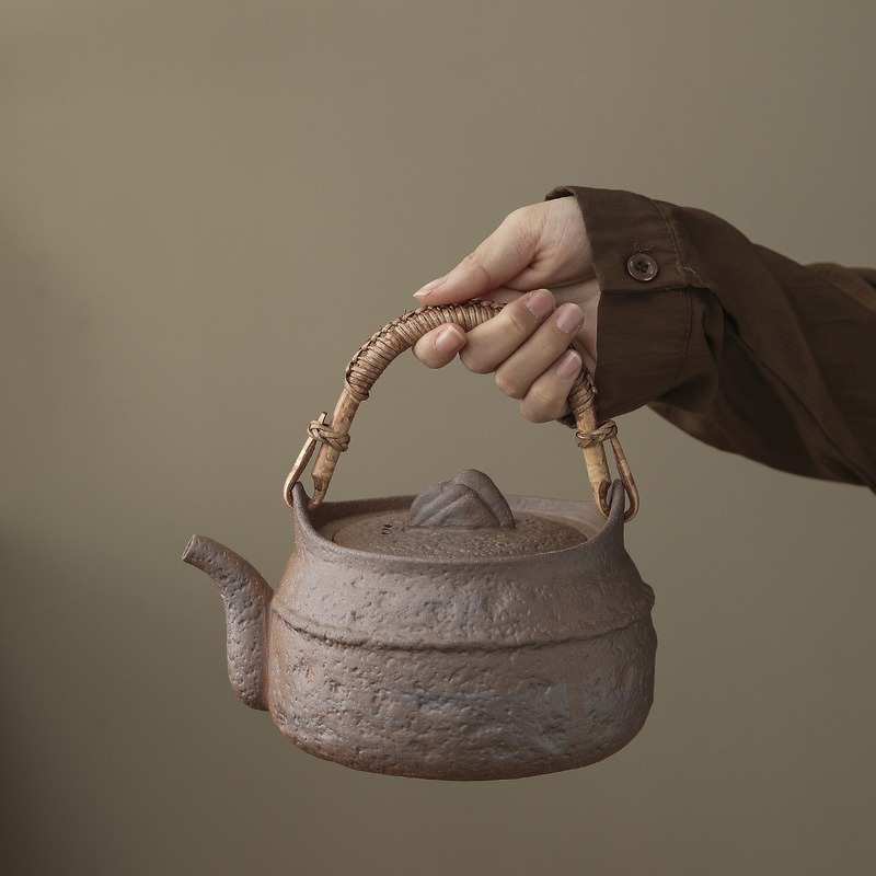 Large rustic ceramic teapot with rattan handle, suitable for tea brewing by the fire, charcoal stove, single pot, vintage style, household health-preserving electric ceramic kettle Large rustic ceramic teapot with rattan handle, suitable for tea brewing by the fire, charcoal stove, single pot, vintage style, household health-preserving electric ceramic kettle