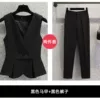 Black vest, trousers