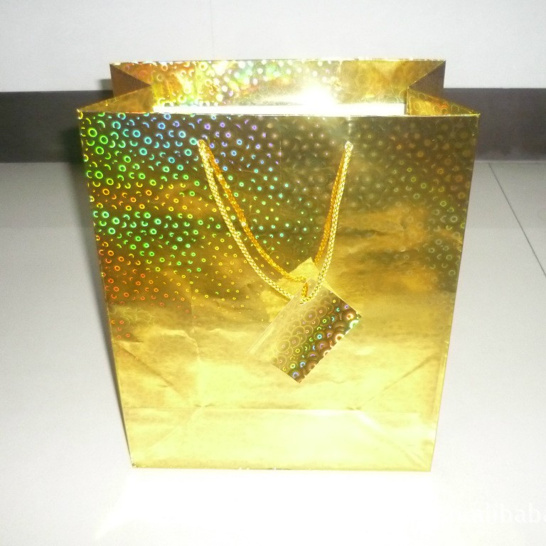 厂家值供157克铜板纸礼品袋购物袋,覆膜纸袋镭射纸袋.