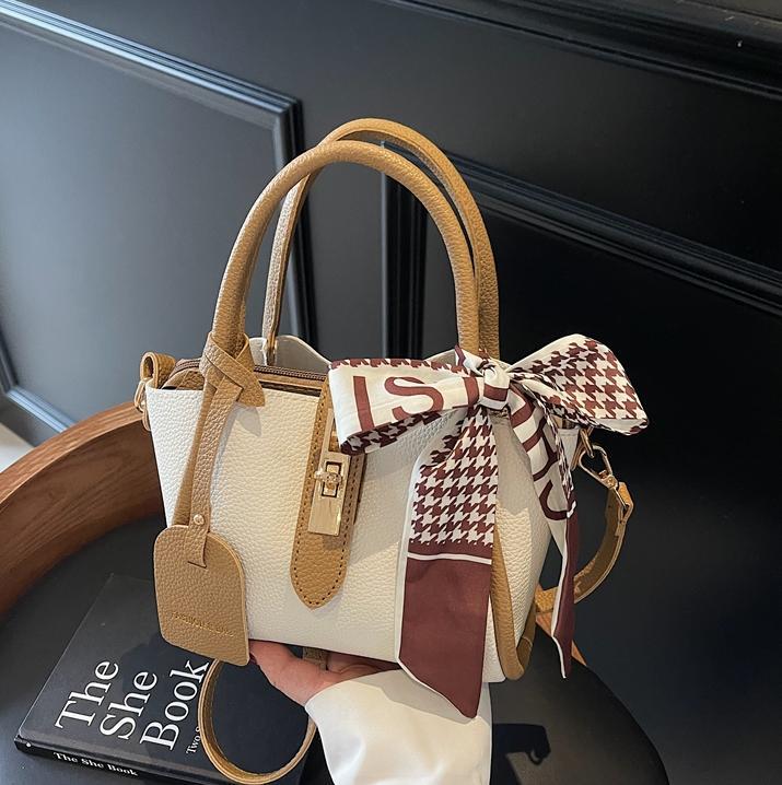 Comercio exterior explosivo bolso de cestas de verduras de mano mujer 2025 nuevo bolso de cinturón simple estilo coreano bolso de cubo de nicho