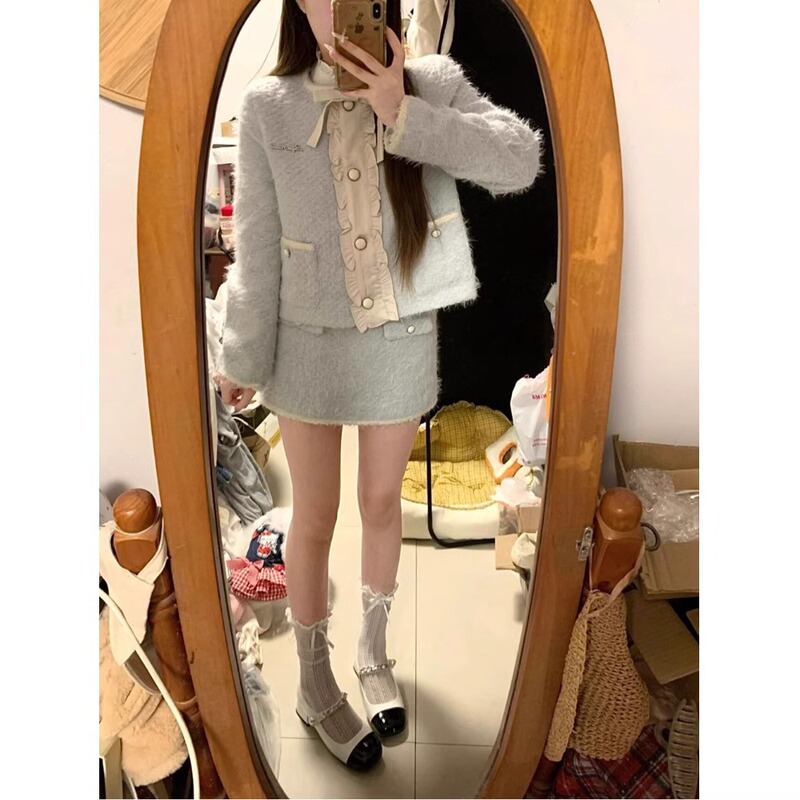 富家千金小香風スーツの女性服の青いカーディガンのコートは秋冬にお尻の半身のスカートの気質の2つのセットを包みます。|undefined