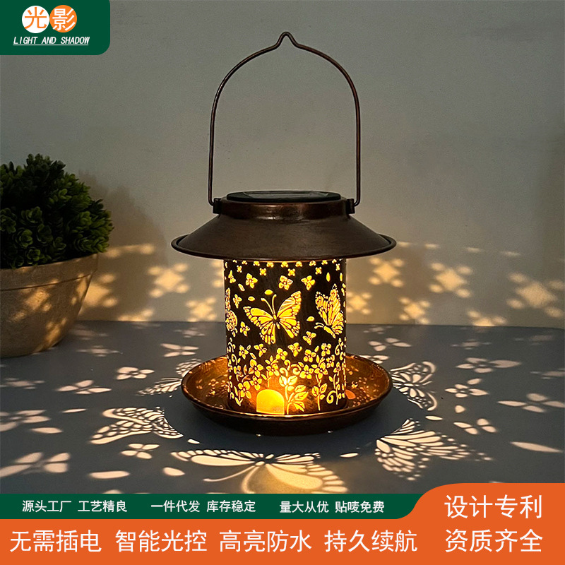 Iron Hollow Solar Flower Butterfly Projector Lamp Garden Lamp…