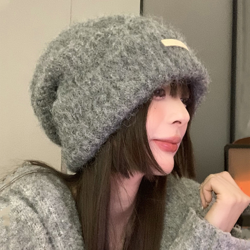 Fashionable woolen demi-season knitted hat