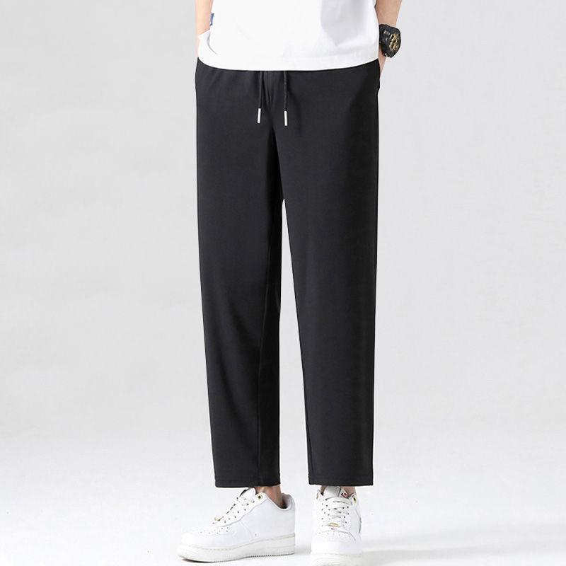 Black trousers, loose straight fit