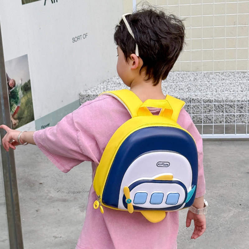 Mochila de cáscara dura para niños aviones de dibujos animados jardín de infantes mochila de cáscara de huevo para niños y niñas mochila tridimensional comercio exterior