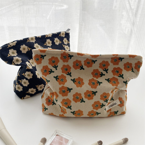 Leather embossed camellia makeup bag, portable, hand-held, women's minimalist daily coin purse, Japanese literary storage bag